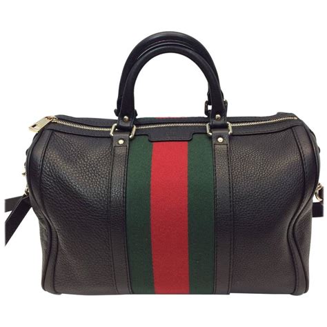 gucci black barrel bag|gucci barrel handbag.